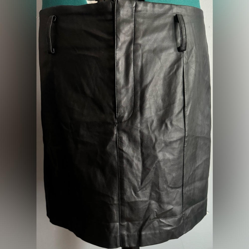 Forever 21 +   Black 82% Rayon and 18% Polyester skirt